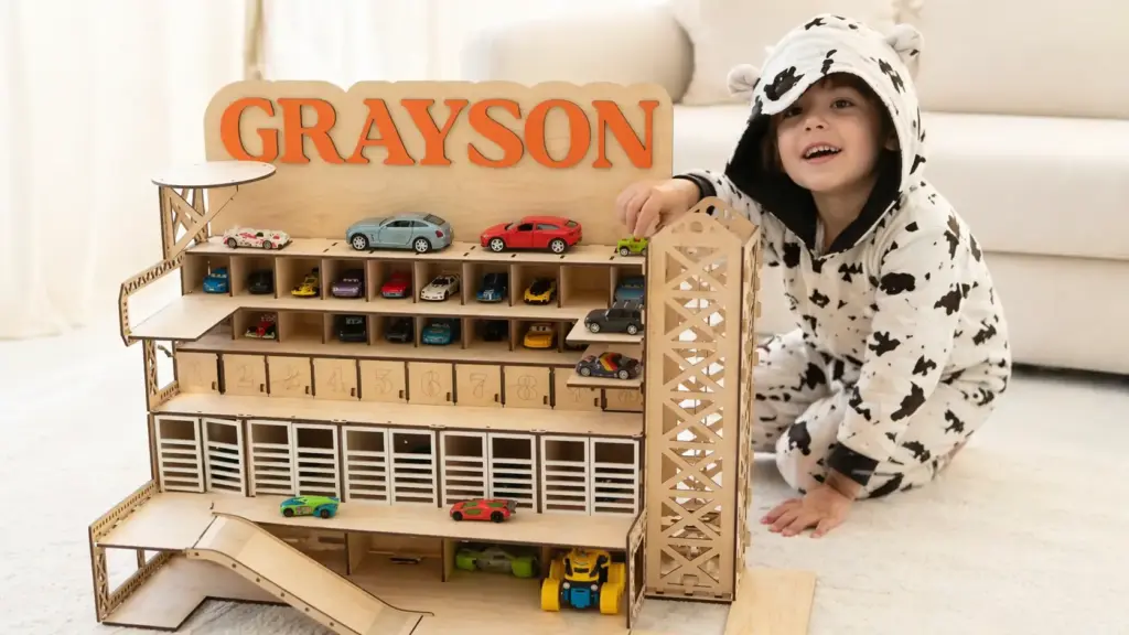 preschooler playing with car garage