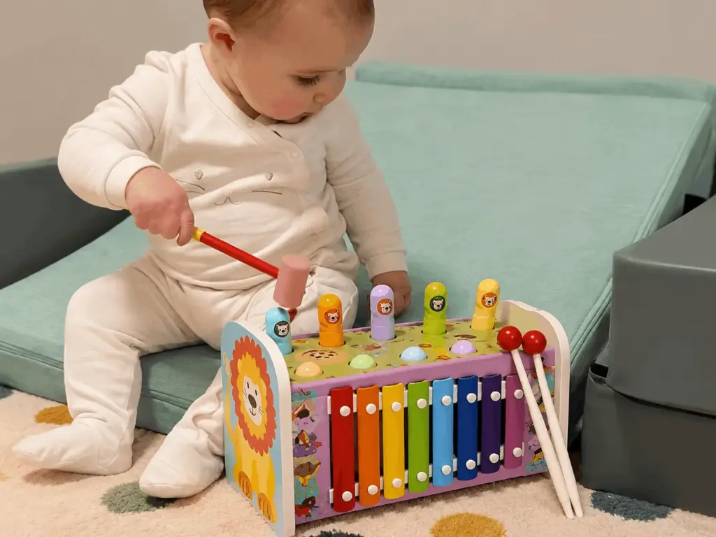 baby playing xylophone